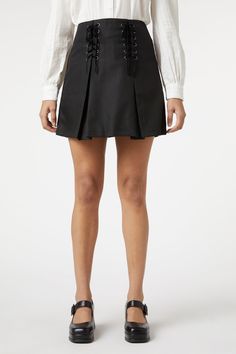 Black pleated mini skirt - mini length finishes above the knee length - front pleats - decorative lace up details - back zip closure - made of a comfortable polyester, cotton, elastane blend- available in black Product Code: PGFW318 Black Pleated Mini Skirt, Bold Heels, Perfect Partner, Keep It Classy, Weekend Brunch, Skirt Mini, Pleated Mini Skirt, Above The Knee, Fabric Care