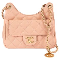 100% authentic Chanel Wavy Hobo Small shoulder bag in beige-peach Caviar leather. Features a front flap pocket with magnetic snap, an open back pocket, light gold-tone hardware. Lined in beige grosgrain fabric with an open pocket against the back. Comes with dust bag, authenticity card and store receipt. Measurements Model 23P AS3710 B10233 NM375 Height 13cm (5.1in) Width 19cm (7.4in) Depth 6cm (2.3in) Drop of the Handle 53cm (20.7in) Shoulder Strap Length 105cm (41in) Hardware Light Gold-Tone B Chanel Beige, Hobo Shoulder Bag, Pocket Light, Small Shoulder Bag, Fashion Handbags, Flap Pocket, Open Back, Dust Bag, Shoulder Strap