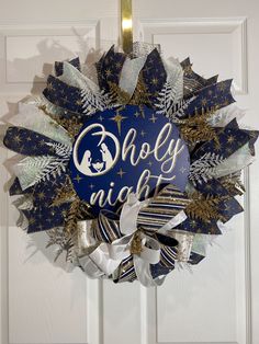 a christmas wreath with the words, holly night on it