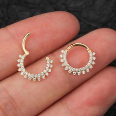 Description: Unique double row clear CZ design makes the diamond septum nose ring more elegant and exquisite, it is a great gift for your love, daughter, for a party, anniversary and so many other occasions. Safe Material: Made of 14K gold, 100% lead-free, 100% nickel-free. Hinged Segment: We made repeated tests to ensure the segment is easy to open and close, and won't fall off. Smooth Surface: High polished smooth surface, comfortable for wearing without sharp edge and no irritation to your sk Gold Septum Ring, Love Daughter, Gold Septum, Septum Nose Rings, Septum Nose, Cartilage Hoop, For Your Love, Diamond Crystal, Infinity Bracelet