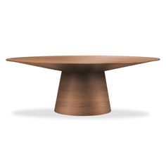 an oval wooden table on a white background