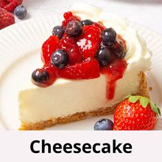 there is a cheesecake with berries on top and the words cheesecake below it