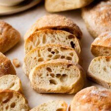 several pieces of bread sitting on top of a table