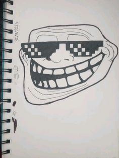 a drawing of a smiling face wearing sunglasses