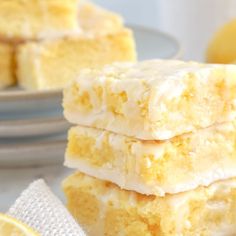 three pieces of lemon cake sitting on top of each other