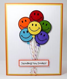 a card with some smiley faces on it and the words sending you smiles written in front of them