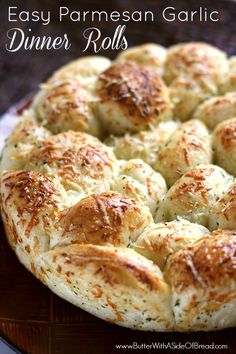 an easy parmesan garlic dinner rolls recipe on a plate with text overlay