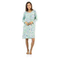 Size recommendation: Size Medium (4-6) Large (8-10) X-Large (12-14) XX-Large (16-18), Order one size up For a more Relaxed Fit Hit the sack in total comfort with this Soft and lightweight Knit Nightgown From Casual Nights in fun printed pattern, Features Button closure, long sleeves, detailed with lace, Satin Ribbon and Embroidery for an extra feminine touch. A comfortable fit perfect for sleeping or lounging around as a housedress. Size: 5X.  Color: Green.  Gender: female.  Age Group: adult. Knit Nightgown, Long Sleeve Nightgown, Muumuu Dress, Plus Size Pajamas, Floral Pattern Design, Female Clothing, House Dress, Beautiful Lady, Clothing Brands