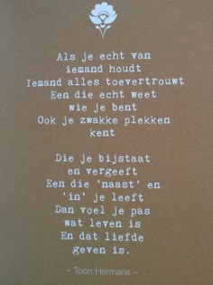 a poem written in german on a brown background with white flowers and words below it