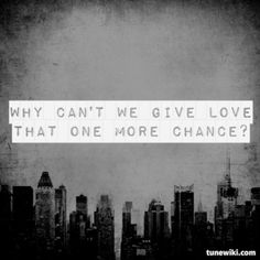 a city skyline with the words why can't we give love that one more chance?