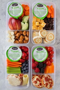 four plastic containers filled with assorted fruits and vegetables