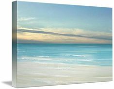 an ocean scene with waves crashing on the beach and blue sky in the back ground