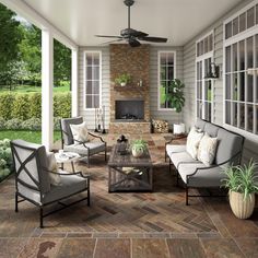 an outdoor living area with furniture and a fireplace