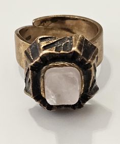 Vintage 1960s Brutalist style ring by Pentti Sarpaneva of Finland. Bronze ring set with a rose quartz. The top of the ring measures 5/8 of an inch on each side, and sits 1/2 an inch above the band. The band is adjustable. The band is stamped inside "P. Sarpaneva", along with "Brass Finland". In great vintage condition. A true statement piece! please double check description and pictures as there are no refunds or exchanges Pentti Sarpaneva, Bronze Ring, Quartz Rose, A Rose, Vintage 1960s, Vintage Stil, Rings Statement, Ring Set, Ring Sets