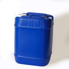 a blue plastic container sitting on top of a white table