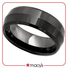 a black ceramic wedding ring with a satin finish