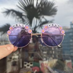 'HELL YEAH' round sunglasses, tint or mirror lenses. Perfect for festivals.  I can also design your glasses with custom text so please use the box provided if you want different wording, or message me to discuss.  Pick your lens colour from the drop down and let me know your decoration choice or I will pick what I think looks & fits best. Approx 5cm diameter All glasses come with fabric case. UV400 All sunglasses are made to order, please allow approx 3 working days for your order to be shipped. Cheap Gradient Lens Sunglasses For Festivals, Cheap Festival Sunglasses With Gradient Lenses, Cheap Rave Sunglasses For Party, Cheap Summer Sunglasses For Music Festival, Affordable Summer Sunglasses For Music Festival, White Festival Sunglasses For Summer, White Sunglasses For Summer Festival, Summer Festival White Sunglasses, Festival Fun Sunglasses With Mirrored Lenses