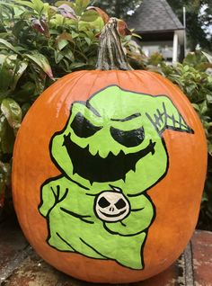 a pumpkin decorated with an image of a cartoon character