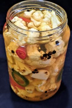 a glass jar filled with lots of food