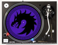 a record player with a dragon on it