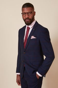 Step up your boardroom game in this windowpane check two piece suit. In a bold colour combo, this two piece will stand the test of time and work well no matter the occasion. Whether wearing to the office, to the bar or to a wedding, you'll be set for top-notch sartorial style. Model wears size 38R blazer & 30R trousers. Features Slim fit Single-breasted blazer Notch lapel Double back vent Four button cuff Double button blazer fastening Complimentary pocket square Functional inside and outside po Plaid Suits For Work, Tailored Plaid Suits For Office, Sartorial Style, Checked Trousers, Colour Combo, Checked Blazer, 3 Piece Suits, Breasted Blazer, Blazer Fashion