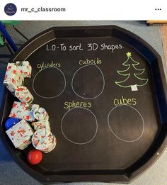 a blackboard with christmas presents on it and the words l o t to sort 3d shapes