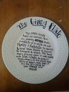 a white plate with words on it that say the giving plate