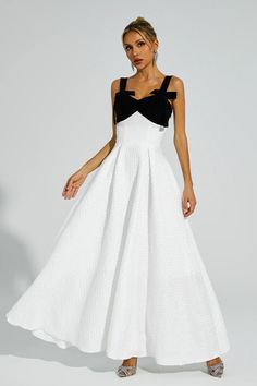 The Camp White Bow Tie Slip Dress exudes an elegant and sophisticated charm. Crafted with utmost care, this dress is perfect for special occasions. Its unique design features beautiful bows tie and delicate straps. With a touch of French chic, this dress embodies the essence of a refined and graceful woman. Ideal for formal events, birthdays, or as a hostess outfit, this dress will elevate your look with its undeniable luxury and finesse.  Dress Length: Approx 150cm Materials: Polyester Gentle D White A-line Dress With Bow Straps, Elegant A-line Dresses With Detachable Bow, White Dress With Bow And Sweetheart Neckline, Sleeveless Prom Dress With Detachable Bow, Formal Sleeveless Maxi Dress With Bow Tie Back, Sleeveless Dress With Detachable Bow For Gala, Elegant Summer Dress With Bow Tie, Elegant Cocktail Dress With Bow Tie, White Evening Dress With Bow Straps