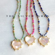 Elevate your jewelry collection with these exquisite handmade beaded necklaces, each adorned with a stunning heart-shaped mother-of-pearl pendant set in a luxurious gold-toned frame. Each necklace is designed to add a touch of elegance and charm to any outfit, making them perfect for both everyday wear and special occasions. Whether you're treating yourself or looking for the perfect gift, these necklaces are sure to impress! D E T A I L S *Tiny seed beads  *Mixed in a random pattern, every neck Pink Heart Beads Necklace For Anniversary, Bohemian Beaded Necklace With Heart Pendant As Gift, Bohemian Beaded Heart Pendant Necklace For Gift, Elegant Heart Beads For Jewelry Making, Elegant Crystal Heart Beads Necklace Gift, Valentine's Day Gift Heart Beads Crystal Necklace, Beaded Charm Necklace Gift, Heart Beads Necklace With Heart Pendant For Mother's Day, Heart Pendant Necklaces With Heart Beads For Mother's Day