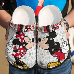 Introducing the Croc Shoes - Clog Shoes Mickey and Minnie mouse, the perfect footwear for all Disney enthusiasts! These adorable clog shoes feature the iconic Mickey and Minnie mouse designs, adding a touch of magic to your everyday style. Crafted with high-quality, lightweight Croslite material, these shoes offer superior comfort and durability. The breathable and water-friendly construction ensures all-day freshness and easy cleaning, making them ideal for any adventure. The adjustable ... Disney Crocs, Minnie Mouse Cartoons, Minnie Mouse Shoes, Croc Shoes, Crocs Fashion, Crocs Clog, Crocs Sandals, Cartoon Shoes, Clogs Style