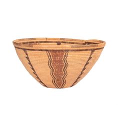 an old woven basket is shown on a white background, with brown and tan designs