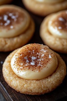 some cookies with icing and sugar on top