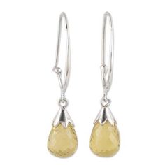 Like glittering dewdrops two gemstones of faceted lemon quartz total ten carats. Indian artisan Tishita Jain creates these half-hoop-style dangle earrings which are crafted with high-polish sterling silver. Faceted Briolette Teardrop Earrings, Yellow Faceted Teardrop Jewelry, Yellow Teardrop Faceted Earrings, Beaded Pendant Necklace, Lemon Quartz, Quartz Earrings, Ethnic Jewelry, Jewelry Packaging, Precious Gemstones