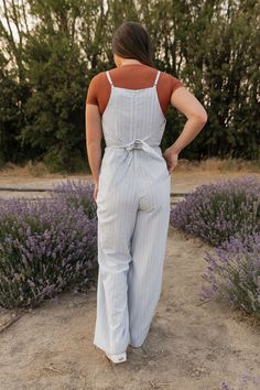 THIS SALE ITEM IS FINAL SALE! Elevate your style with our Parker Overalls! Vertical stripes create a slimming effect, while adjustable straps ensure a perfect fit. The fitted waist with back tie adds a touch of femininity, and the wide leg provides comfort and effortless style. Embrace the versatility of these overalls for any occasion. Fitted waist; wide leg* Material Content: 55% Cotton // 45% Polyester Material Pattern: Vertical stripes Model is wearing a size small Click here for top Not sur Pregnant Wedding, Heel Accessories, Mom Dress, Knee Length Dresses, Vertical Stripes, Light Denim, Long Blouse, Sweater Blouse, Scrunchie Hairstyles