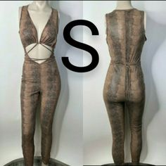 Brand New Sabora Brand Size S Sexy Fashion Croc Print Open Front Jumpsuit! Croc Print Thick Mesh Material Open Front Bust Tie Skinny Leg Bodycon Fit 95% Polyester 5% Spandex Measurements Bust: 36 Waist: 27 Hips: 36 Length: 58inch (B&B-Cp-Oj-S #370) Stock Reference Number ~~~~~~~~~~~~~~~~~~~~~~~~~~ 2-5 Items 15% Off & 6-10 Items 25% Off & 11+ Items 35% Off On Bundles & Save $$$ Dealdepends On How Many Items In The Bundle *!~Message Me On The Items, And I Will Create A Special Bundle Listing For Y Brown Stretch Jumpsuits And Rompers For Party, Brown Fitted V-neck Jumpsuits And Rompers, Brown Fitted V-neck Jumpsuit, Trendy Brown Jumpsuits And Rompers For Night Out, Trendy Brown Jumpsuit For Night Out, Brown Jumpsuit For Night Out In Spring, Stock Reference, Croc Print, Mesh Material