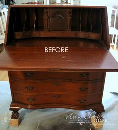 an old desk has been refinished with new paint and waxed to look like wood