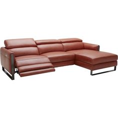 a brown leather sectional sofa sitting on top of a white floor