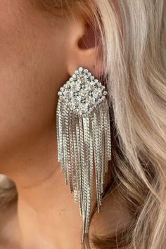 Our Sophia Diamond Tassel Drop Earrings are a perfect addition to elevate any outfit. Wear them for a night out, special occasion or event, Holiday party, wedding, Formal and more! Featuring gold plated stainless steel, a diamond top with cz stones, fringe tassel, and push backing. 4" drop length.