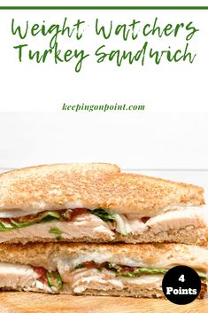 a turkey sandwich cut in half on a cutting board with the words weight watchers turkey sandwich