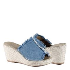 Turn heads in comfort in the Diba True Women's Go Party Denim Slip-On Wedge Sandal. This denim wedge is accompanied by a jute heel, padded insole, and round toe. Crafted from durable materials, these sandals are made to last. Wedge Sandal Denim Upper Jute 3 in. Wedge Heel Round Toe Summer Denim Sandals For The Beach, Denim Blue Slip-on Sandals For Summer, Denim Slip-on Sandals For The Beach, Denim Blue Sandals For The Beach, Summer Denim Sandals For Beach, Denim Blue Round Toe Sandals For Beach, Denim Blue Platform Sandals For Summer, Denim Blue Round Toe Sandals For Summer, Casual Denim Wedge Sandals With Open Toe