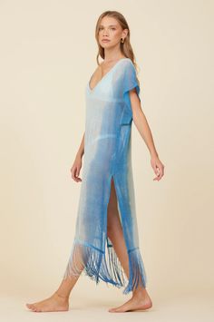 Your new favorite coverup for your next vacay, the new Metallic Mesh Knit Cover Up in Blue! Perfect for summer days, this coverup will have you looking stylish and feeling comfortable. Say goodbye to boring coverups and hello to fun in the sun with this metallic beauty featuring tassels at the bottom! Blue Breezy Summer Cover-up, Blue Bohemian Cover-up For Beach Party, Blue Beach Dress For Poolside Spring, Blue Bohemian Cover-up For Resort Season, Blue Beach Dress For Spring, Blue Beachy Beach Dress For Vacation, Blue Beachy Dress For Vacation, Spring Blue Beach Dress, Blue Spring Beach Dress