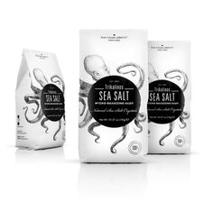 three bags of sea salt next to each other