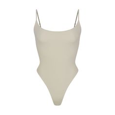 Find SKIMS Fits Everybody Cami Bodysuit on Editorialist. With its wide scoop neckline and low back providing the perfect foundation under clothing, this Cami Bodysuit is an essential wardrobe foundation. Features a high cut leg opening and thong back that remains invisible under clothing. Under Clothing, Suit White, Cami Bodysuit, Essential Wardrobe, Perfect Foundation, Body Suit, High Cut, Low Back, Scoop Neckline