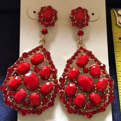 Red /Gold Dangle Earrings Pierced Never Worn. Red Chandelier Earrings For Formal Events, Elegant Red Earrings For Party, Formal Red Chandelier Earrings, Red Drop Earrings For Party, Red Clip-on Earrings For Wedding, Elegant Red Clip-on Earrings For Party, Red Teardrop Earrings For Formal Occasions, Red Clip-on Earrings For Evening, Red Crystal Drop Earrings For Pierced Ears