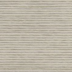 an up close view of the wood grain pattern on a wallpapered surface in grey tones