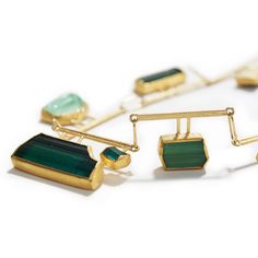 18K & 22K yellow gold, 12 rough green tourmalines 68.10 ctw • 21.50" (54.61cm) length of necklace • 0.83" (2.11cm) width of necklace • 18K gold hook and eye clasp • One of a kind Modern Green Tourmaline Jewelry, Modern Gold Tourmaline Jewelry, Unique Green Tourmaline Jewelry, Extraordinary Jewelry, Art Earrings, Green Tourmaline, Silver Earrings Dangle, Center Stage, Jewelry Designs