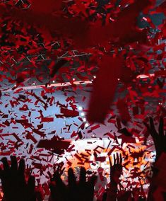 confetti falling from the ceiling at a concert