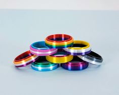 These pride fidget rings are 3D printed in colors to match a large selection of pride flags. They are printed in PLA which is a sustainable plant-based plastic. They are also custom-sized to US ring sizes. Due to 3D printing with color changes, there may be minor blemishes in the plastic, however, I will ensure each ring is uniform and smooth to the touch. I designed these rings for pride month to create more options of fidget rings for many genders and sexualities. If you'd like discreet packag Lgbtq Flag, Lgbtq Quotes, Lgbtq Funny, Pride Jewellery, Lgbtq Flags, Lgbt Love, Fidget Rings, Spinner Ring, Crochet Shoes