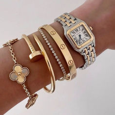 The exquisite design of this gold nail clover bracelet set makes it a standout piece in any jewelry collection. A perfect blend of luxury and style. Elegant Polished Bangle, Elegant Polished Bangle For Everyday Luxury, Elegant Bangle With Polished Finish For Everyday Luxury, Elegant Polished Gold Bracelet, Elegant Gold Bracelet With Polished Finish, Elegant Stackable Jewelry For Everyday Elegance, Elegant Gold Bracelet With Polished Finish For Luxury, Luxury Gold Plated Bracelet Gift, Luxury Rose Gold Stackable Bracelets