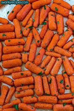 there are many carrots that have been cut up and placed on a paper towel